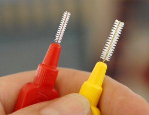 Red and yellow interdental brushes