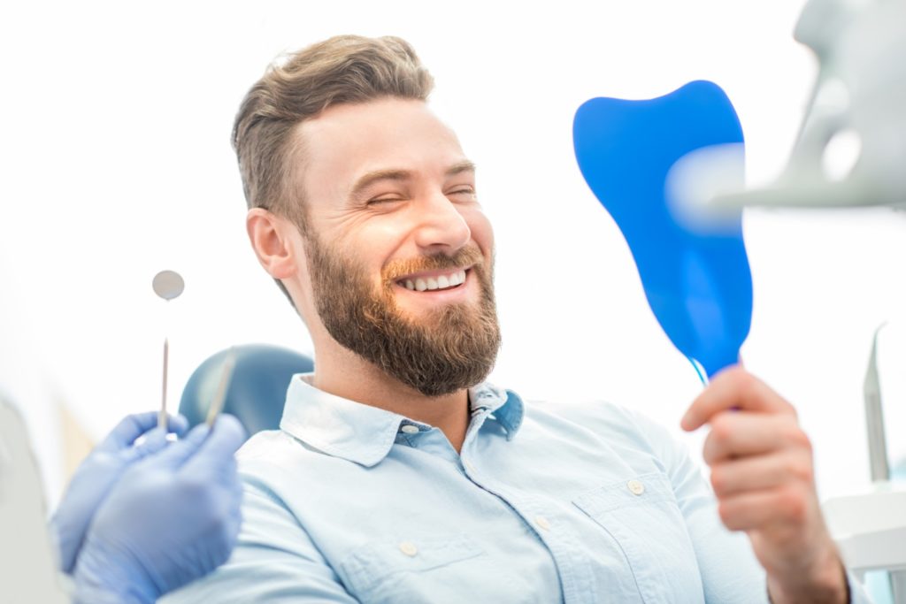 Man happy about his teeth