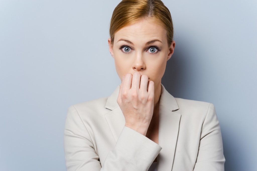women biting her nails