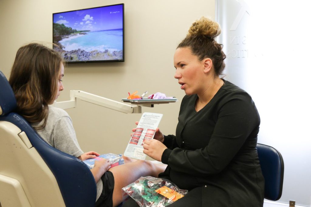 Dillehay assistant explaining to patient